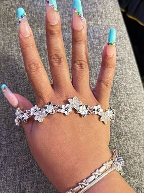 Sparkling Napier Silver Floral Bracelet – Elegant Women's Jewelry